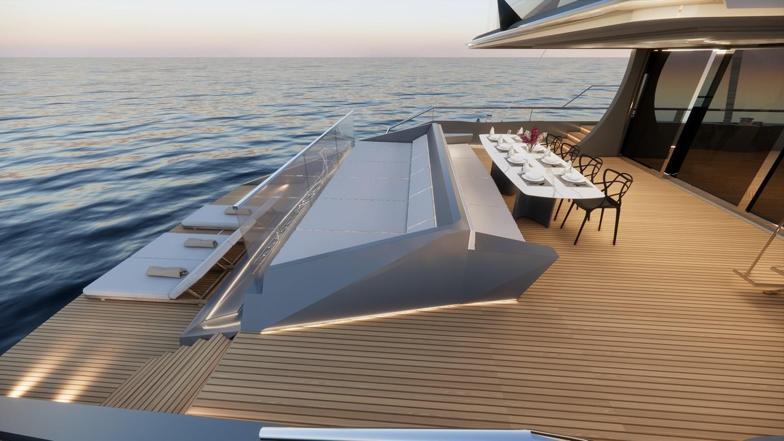 a deck with a table and chairs on it aboard BOA KINGDOM Yacht for Sale