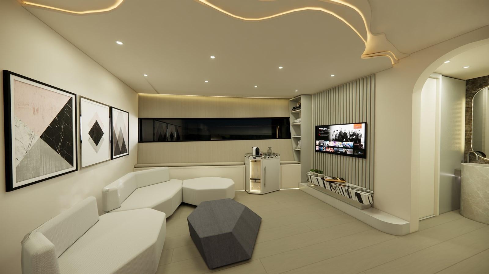 a room with a couch and a tv aboard BOA KINGDOM Yacht for Sale