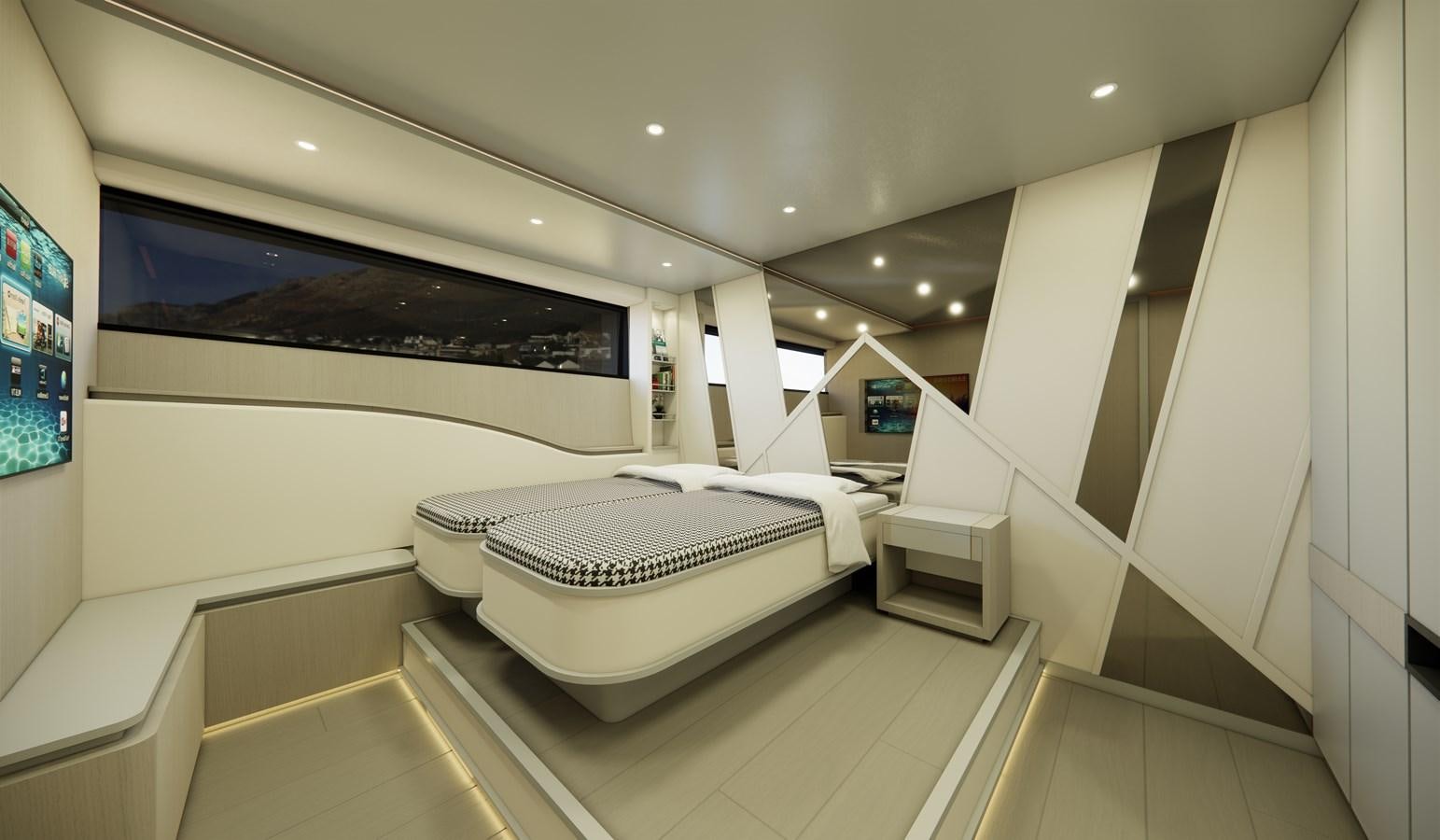 a room with a bed and a tv on the wall aboard BOA KINGDOM Yacht for Sale