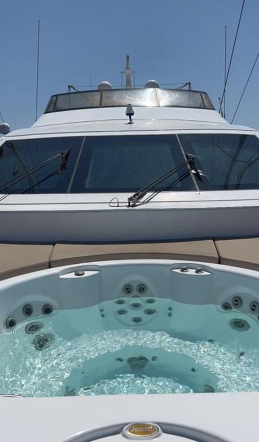 a white boat with a seal on it aboard AURORA Yacht for Sale