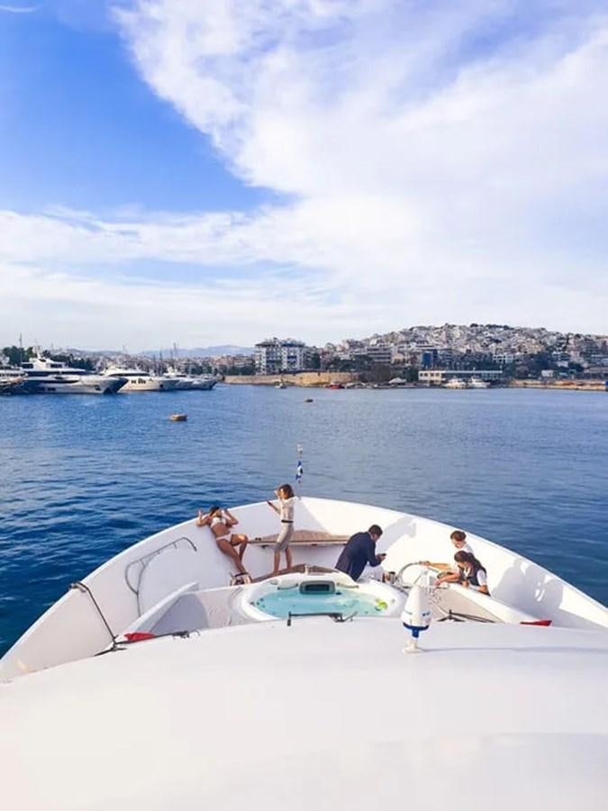 a group of people on a boat aboard AURORA Yacht for Sale