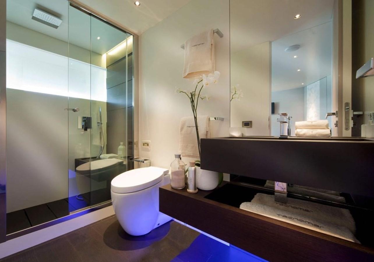 a bathroom with a large mirror aboard AURORA Yacht for Sale