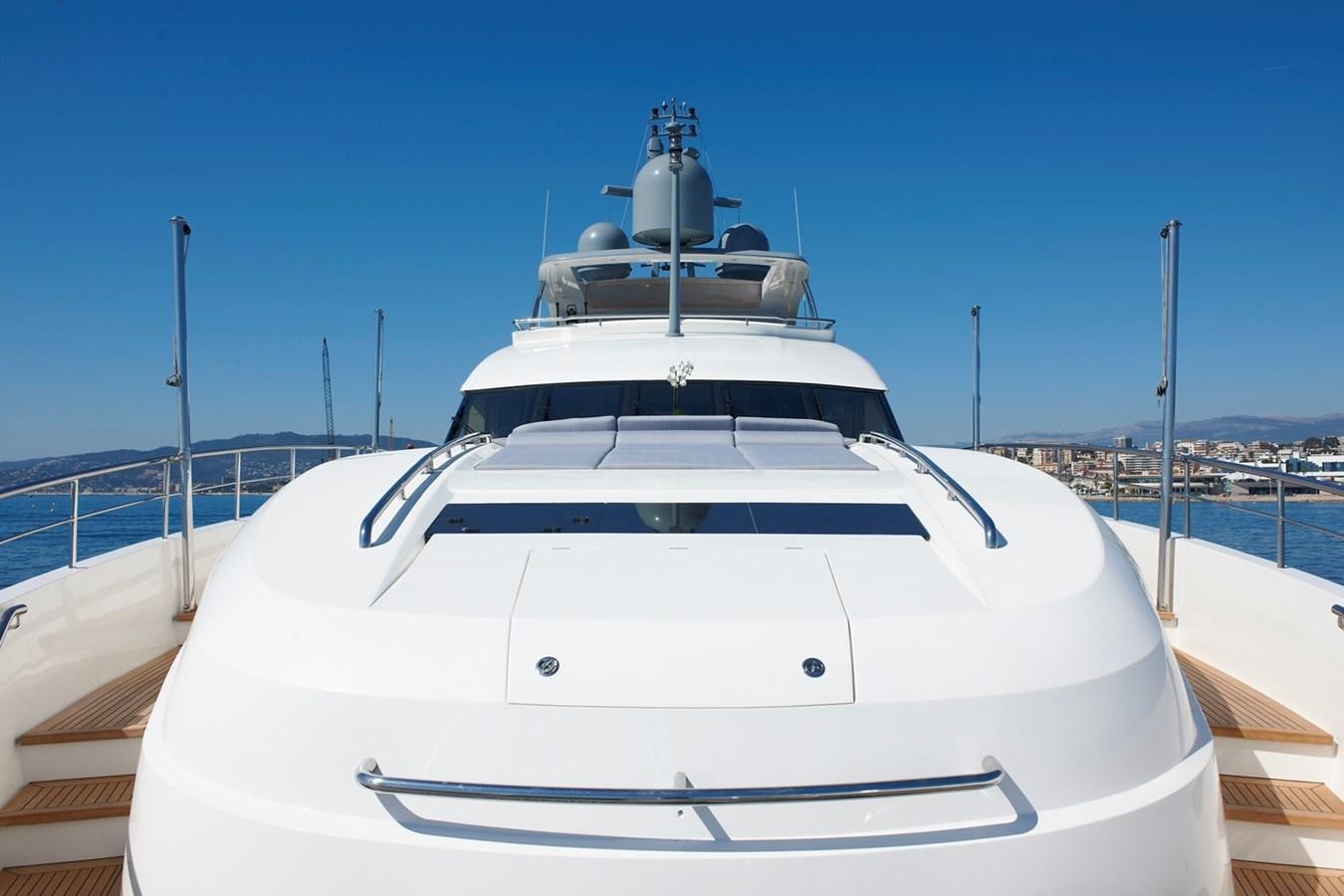 a white yacht on a dock aboard IMPERIAL PRINCESS BEATRICE Yacht for Sale
