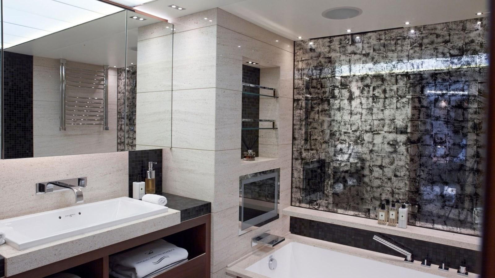 a bathroom with a large glass shower aboard IMPERIAL PRINCESS BEATRICE Yacht for Sale