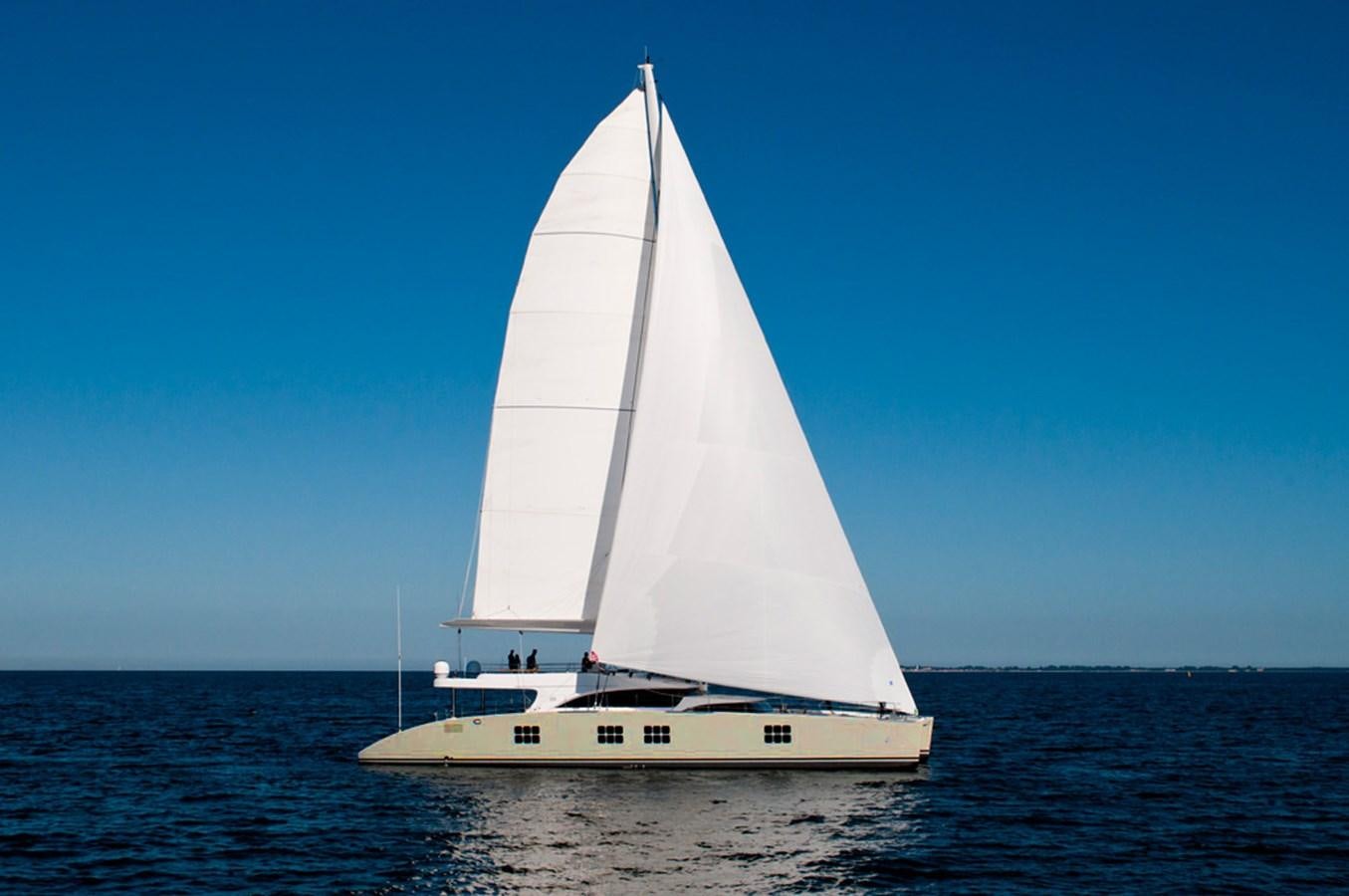a white sailboat on the water aboard IPHARRA Yacht for Sale