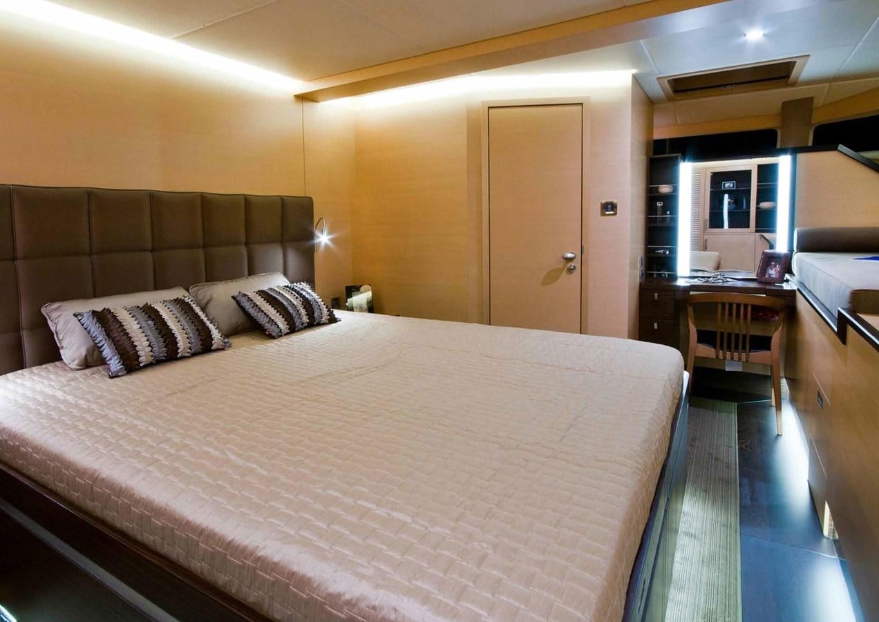 a bed in a hotel room aboard IPHARRA Yacht for Sale