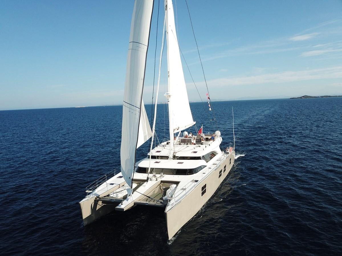a white boat in the water aboard IPHARRA Yacht for Sale