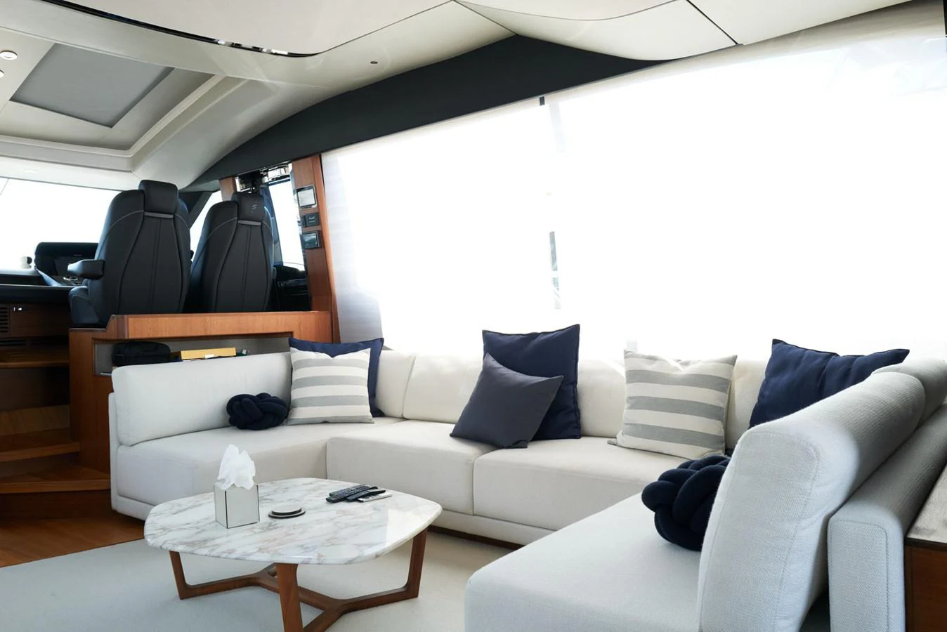a white couch with pillows aboard PRINCESS M Yacht for Sale