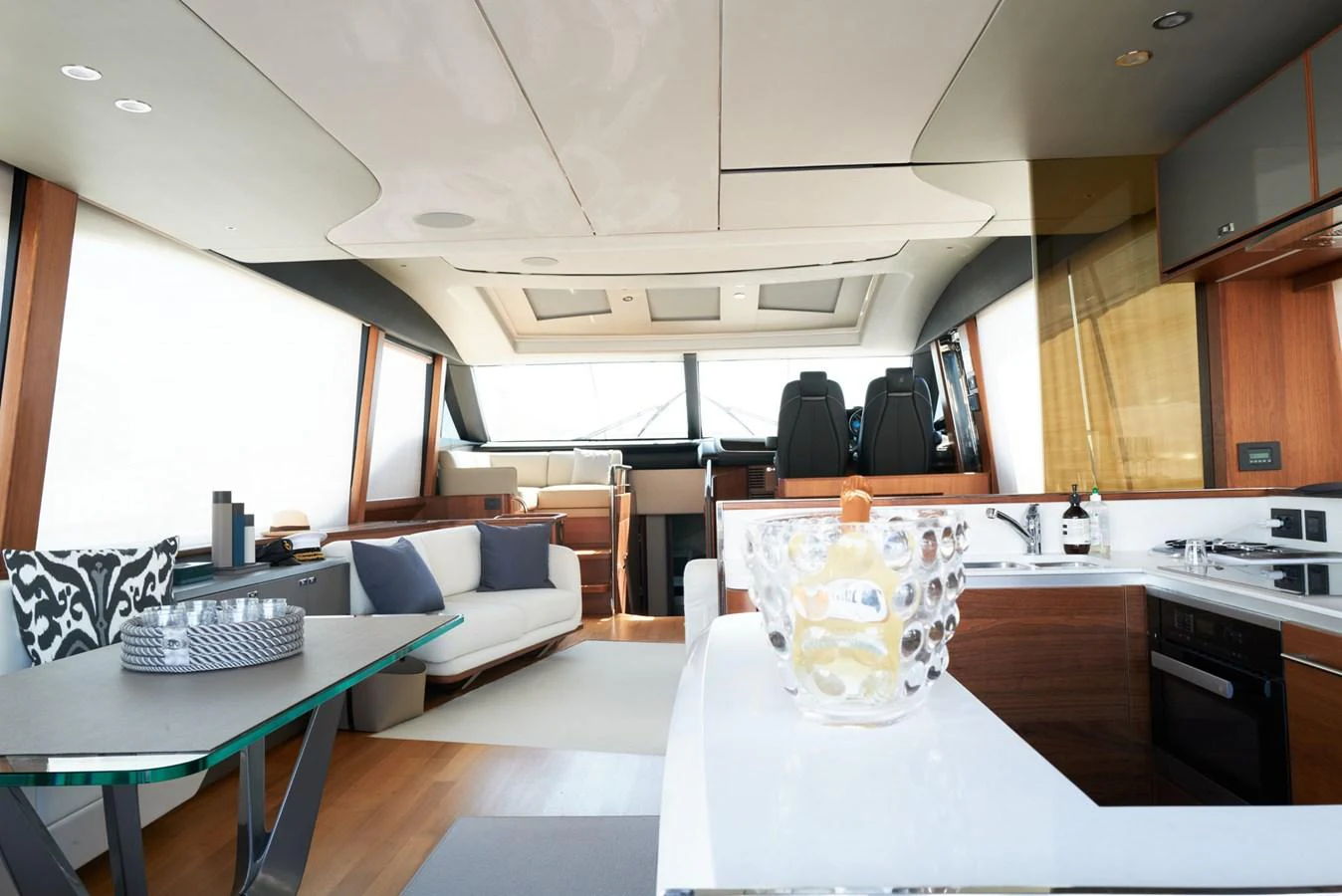a large kitchen with a large dining table aboard PRINCESS M Yacht for Sale