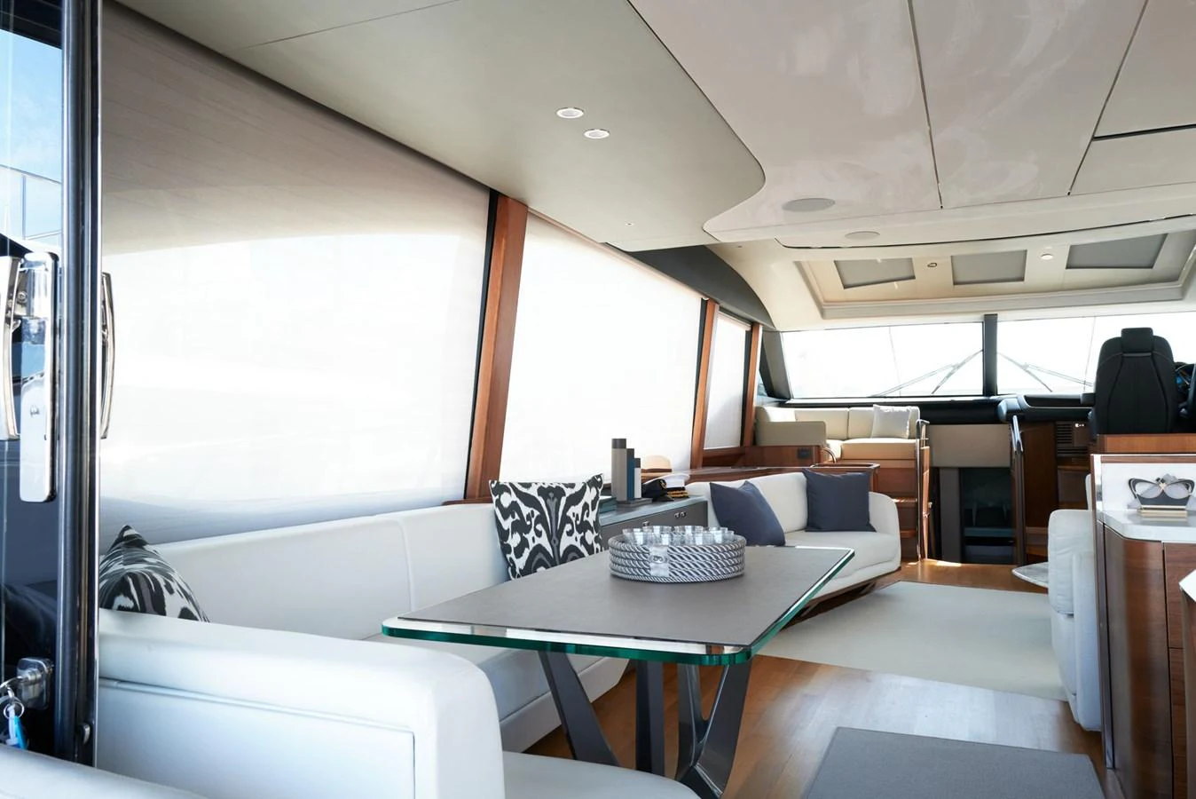 a room with a table and chairs aboard PRINCESS M Yacht for Sale
