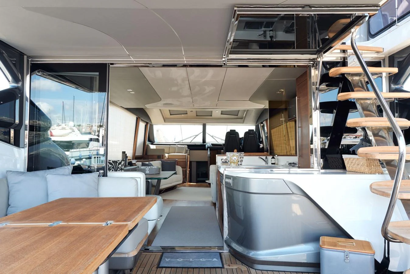 a room with a table and chairs aboard PRINCESS M Yacht for Sale