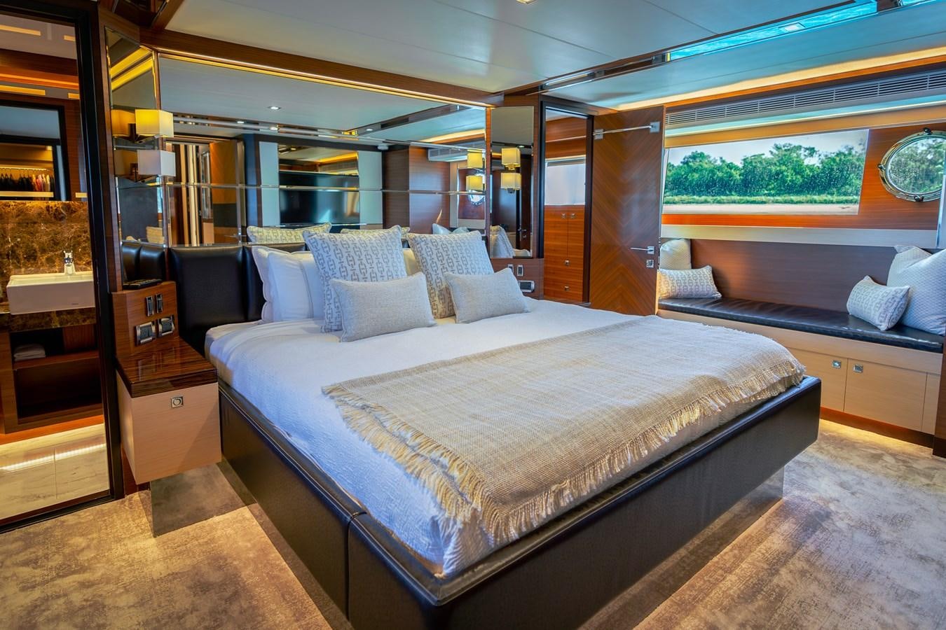 a bed in a room aboard LEGGERA Yacht for Sale