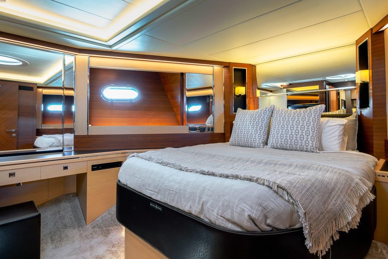 a bed in a room aboard LEGGERA Yacht for Sale