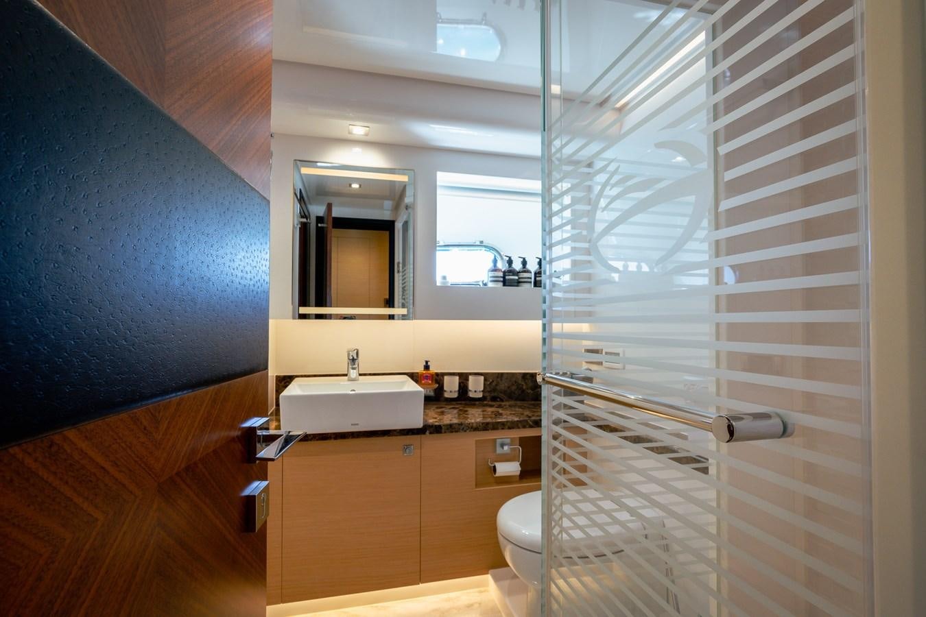 a bathroom with a shower unit and sink aboard LEGGERA Yacht for Sale