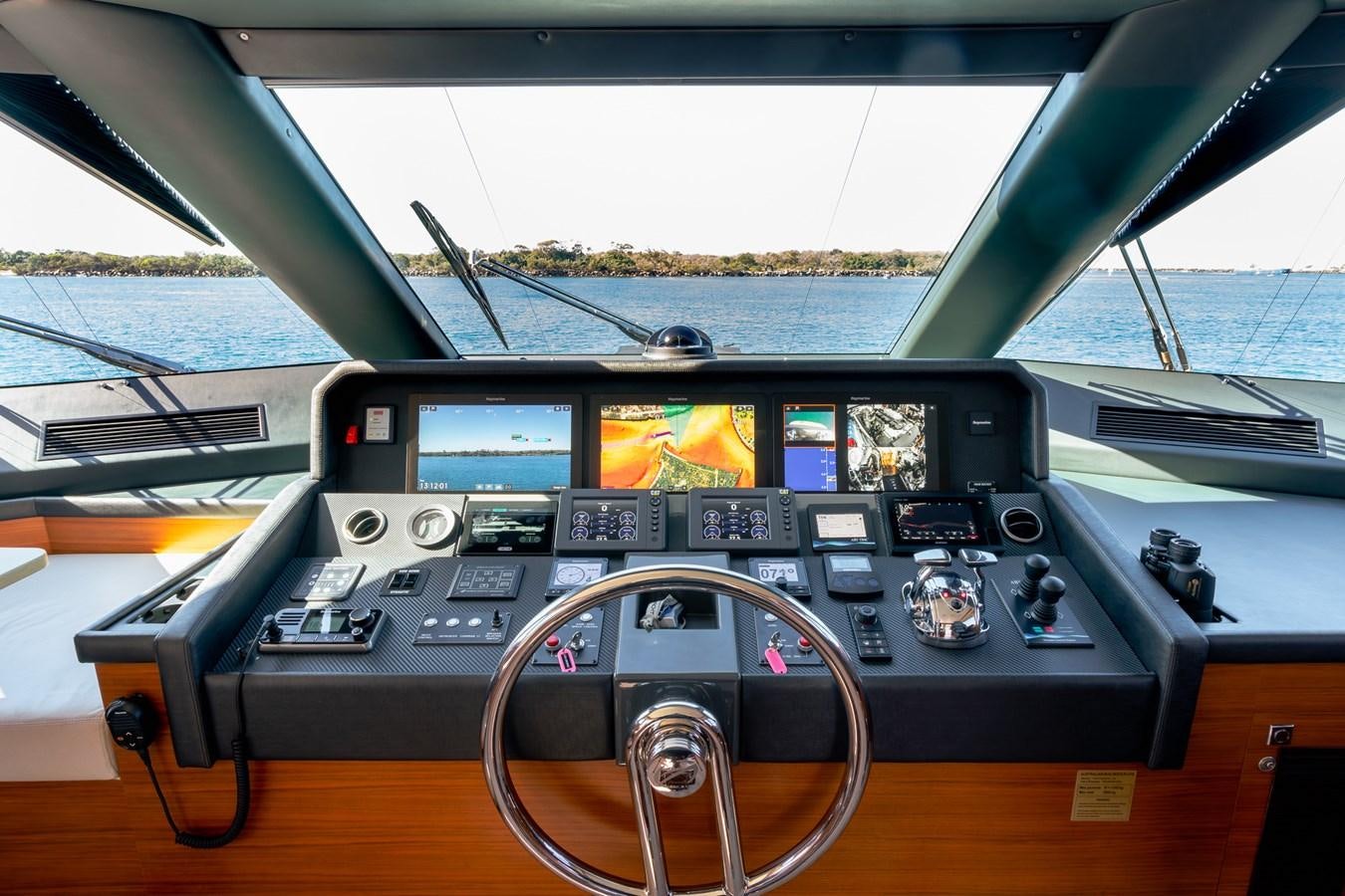 the inside of a car aboard LEGGERA Yacht for Sale