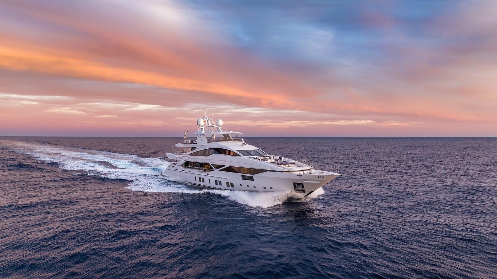 a white yacht on the beach aboard NEW WAVES Yacht for Sale