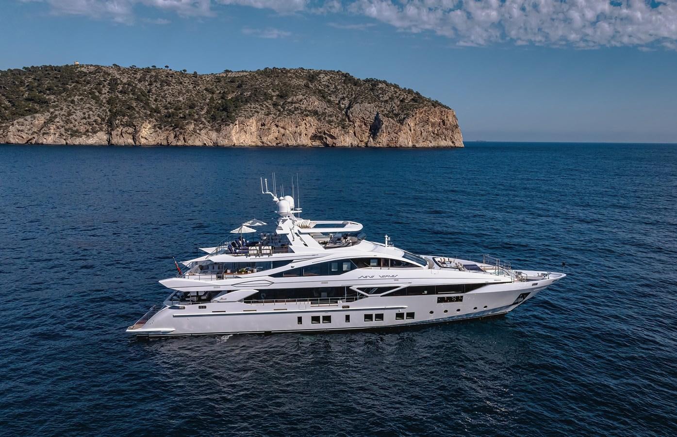 a white boat in the water aboard NEW WAVES Yacht for Sale