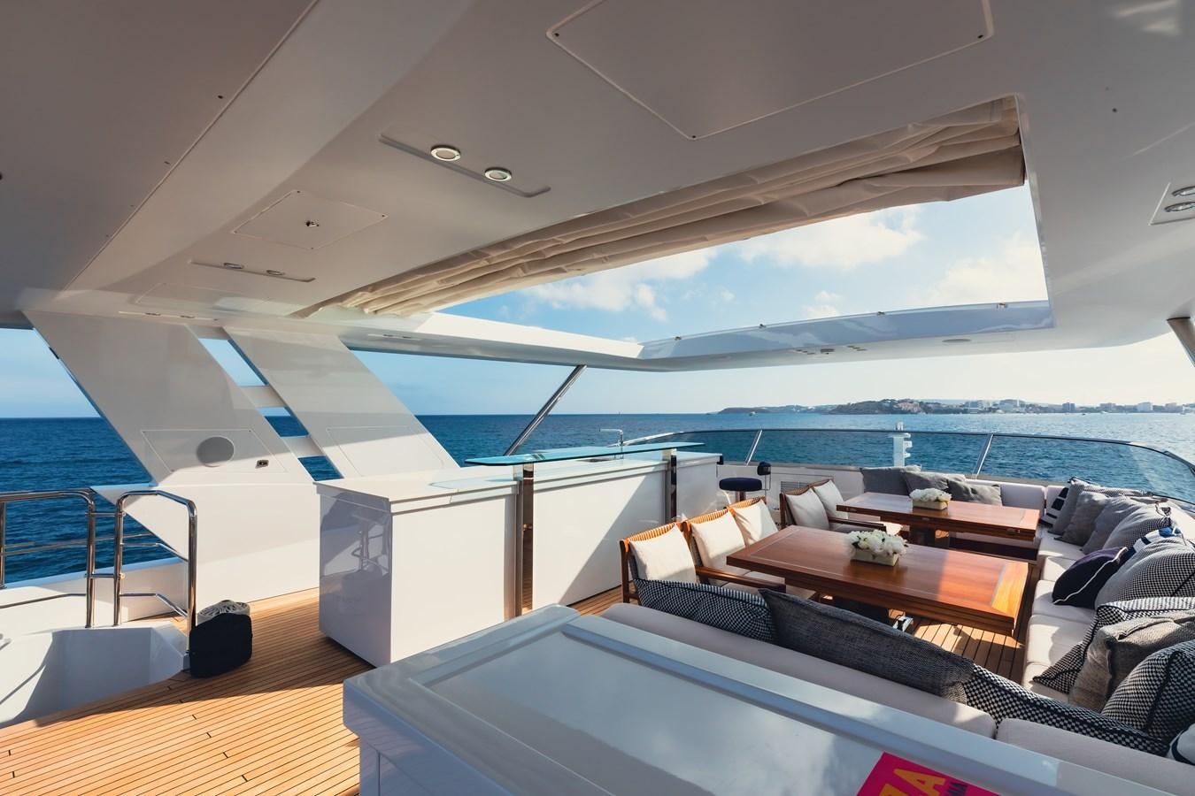 a boat with a view of the ocean aboard NEW WAVES Yacht for Sale