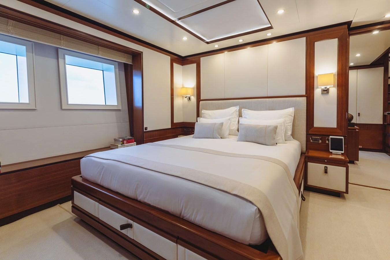 a room with two beds aboard NEW WAVES Yacht for Sale
