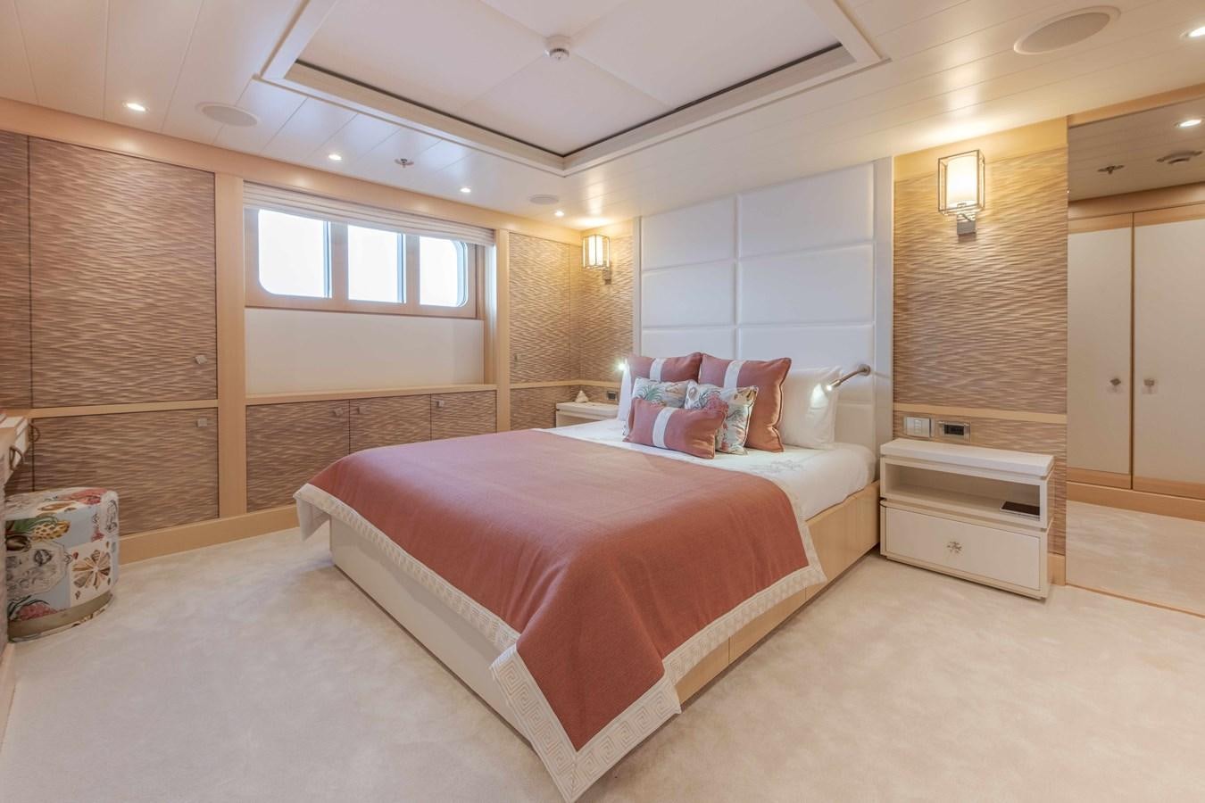 a large bedroom with a bed aboard SPIRIT Yacht for Sale