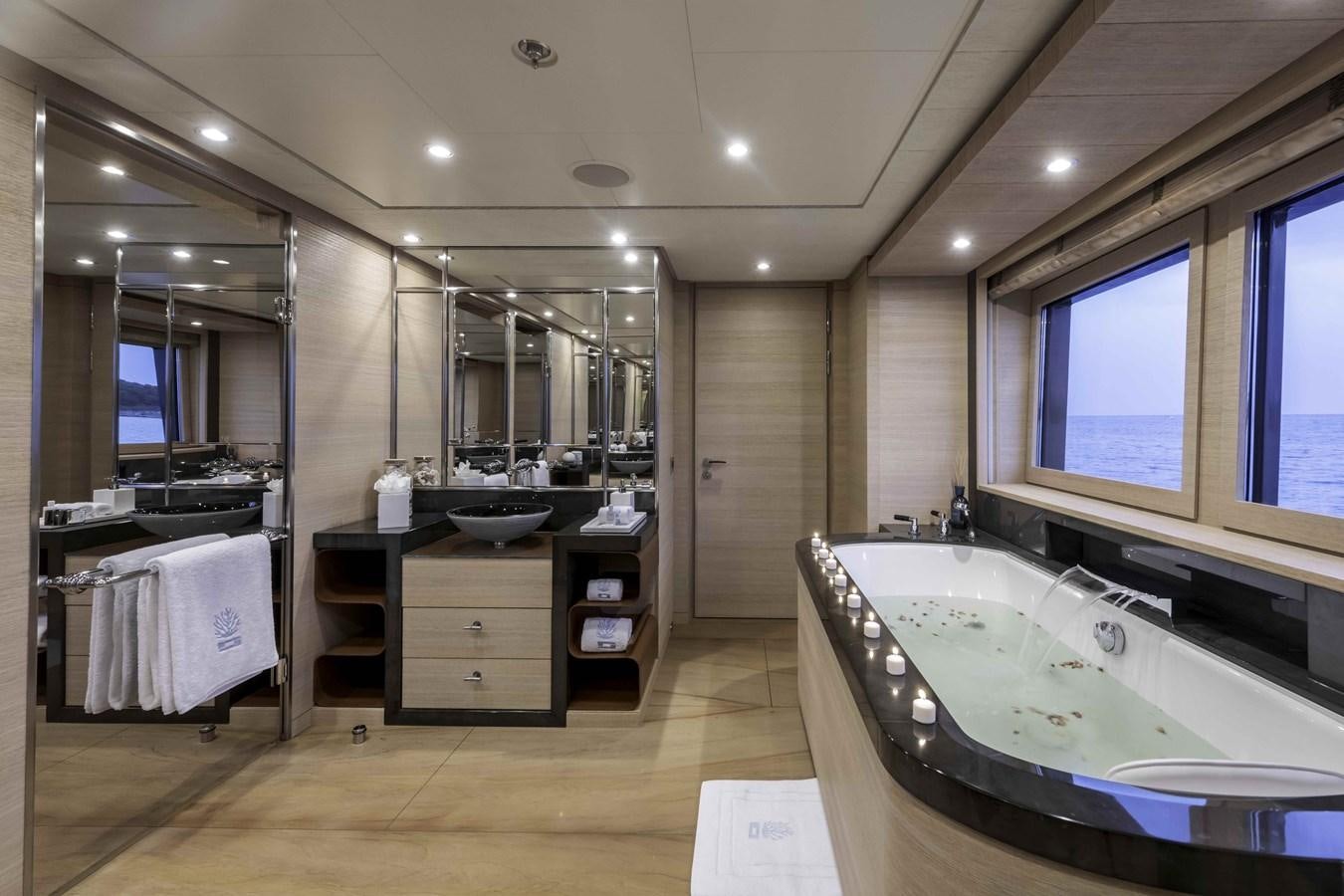 a bathroom with a large bathtub aboard SPIRIT Yacht for Sale