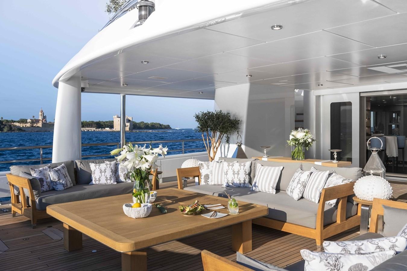 a living room with a large patio aboard SPIRIT Yacht for Sale