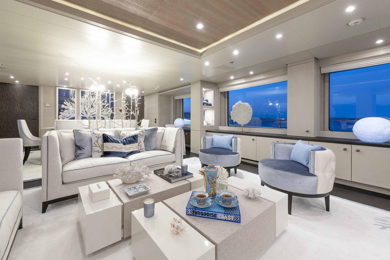 a living room with a large window aboard SPIRIT Yacht for Sale