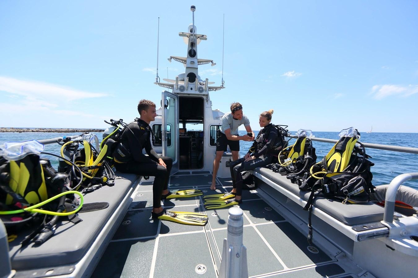 a group of people on a boat aboard SPIRIT Yacht for Sale