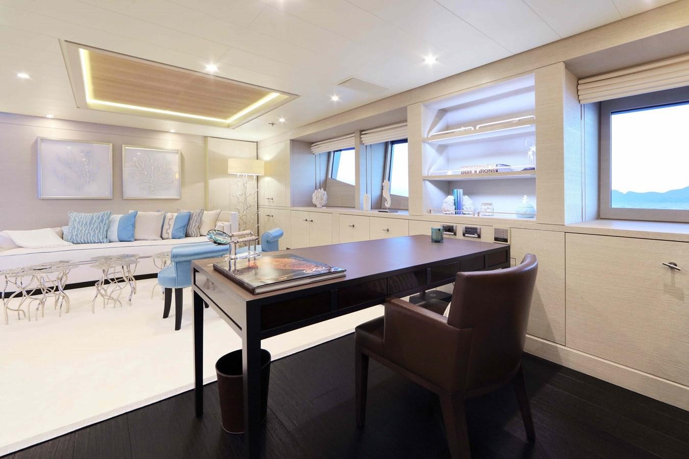 a room with a table and chairs aboard SPIRIT Yacht for Sale