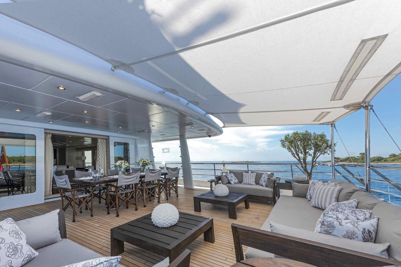 a living room with a large patio aboard SPIRIT Yacht for Sale
