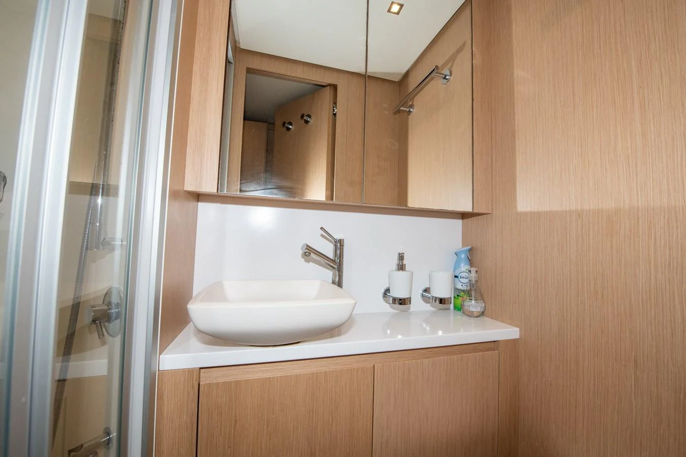 a bathroom with a sink and a mirror aboard OUR ALEPH Yacht for Sale