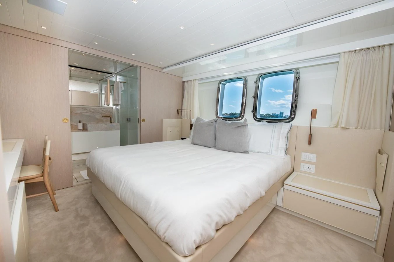 a room with a bed and a television aboard OUR ALEPH Yacht for Sale