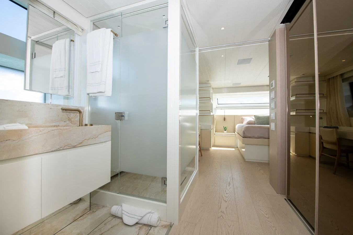 a bathroom with a tub and shower aboard OUR ALEPH Yacht for Sale