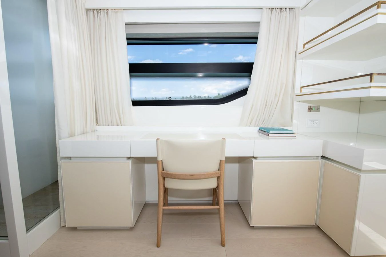 a chair in a room aboard OUR ALEPH Yacht for Sale