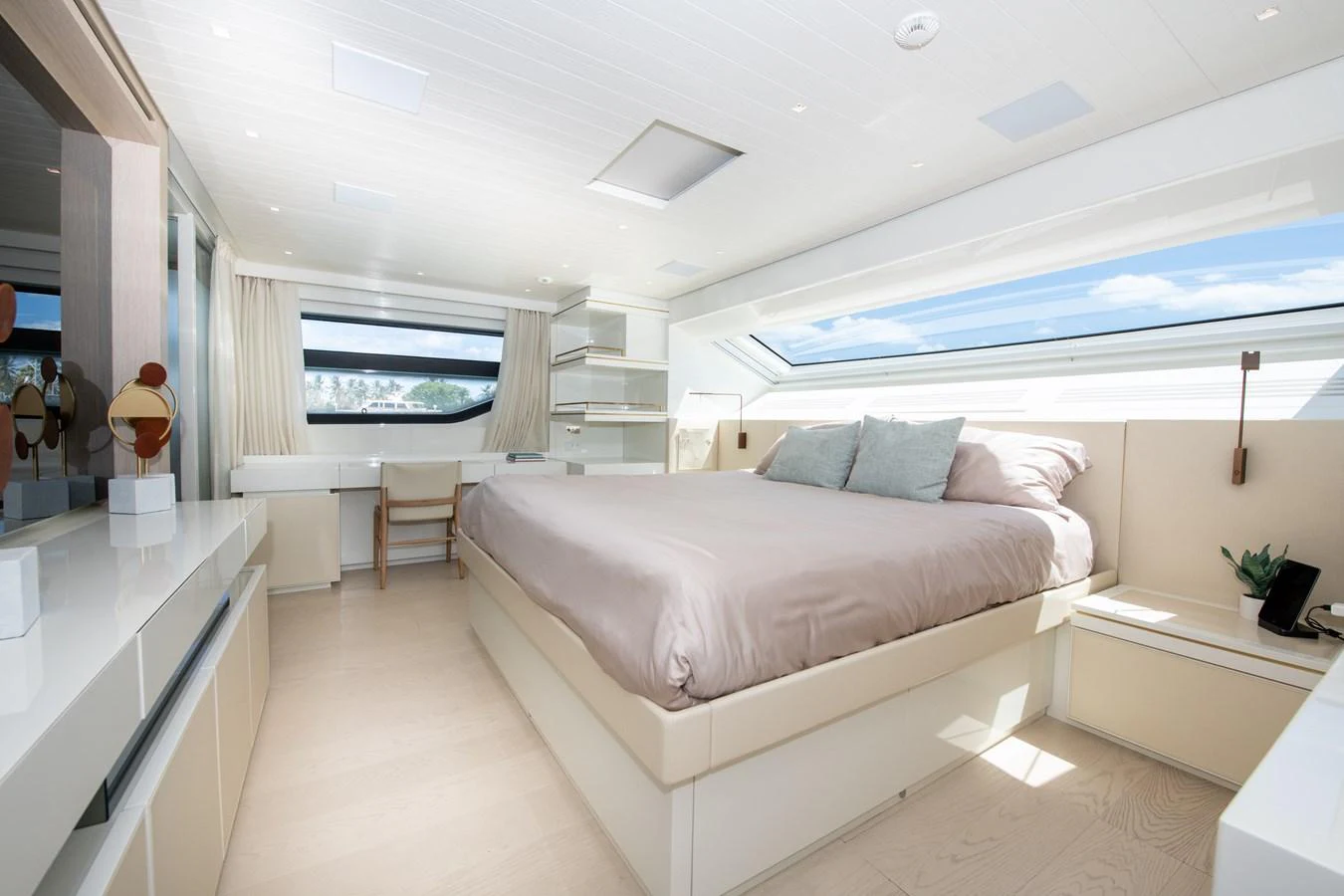 a room with a bed and a desk aboard OUR ALEPH Yacht for Sale