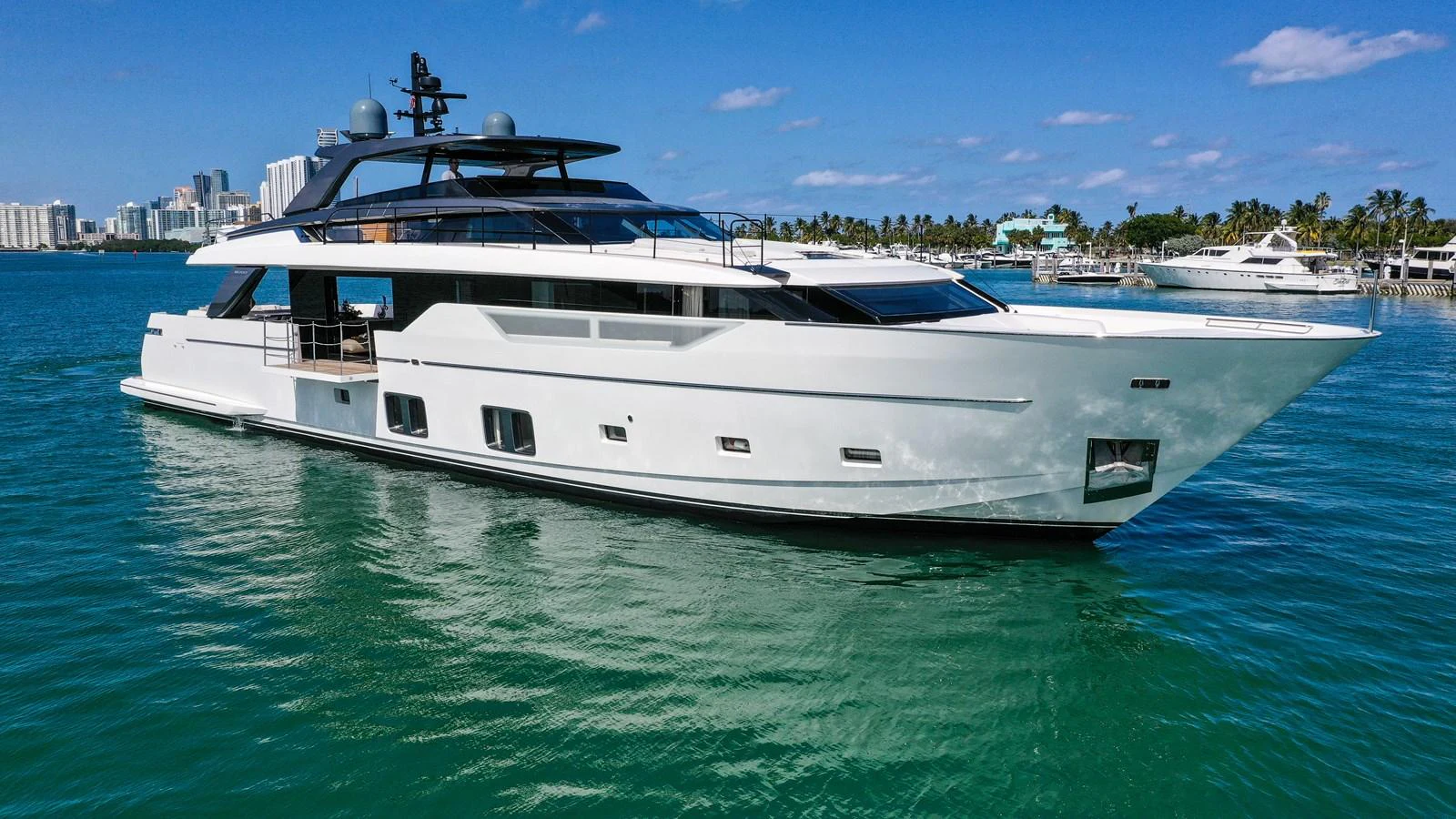 a white yacht in the water aboard OUR ALEPH Yacht for Sale
