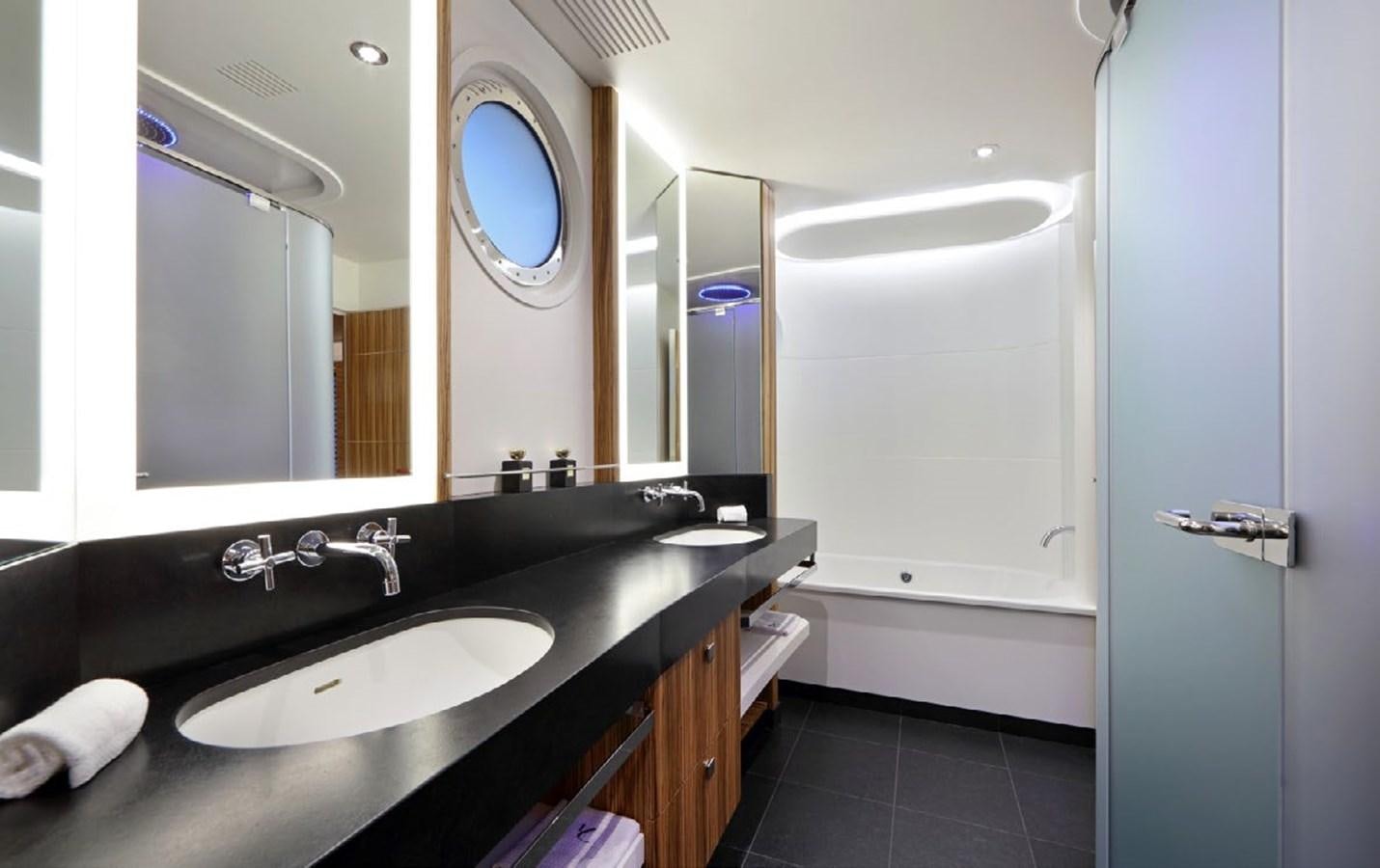 a bathroom with a sink and a bathtub aboard YERSIN Yacht for Sale
