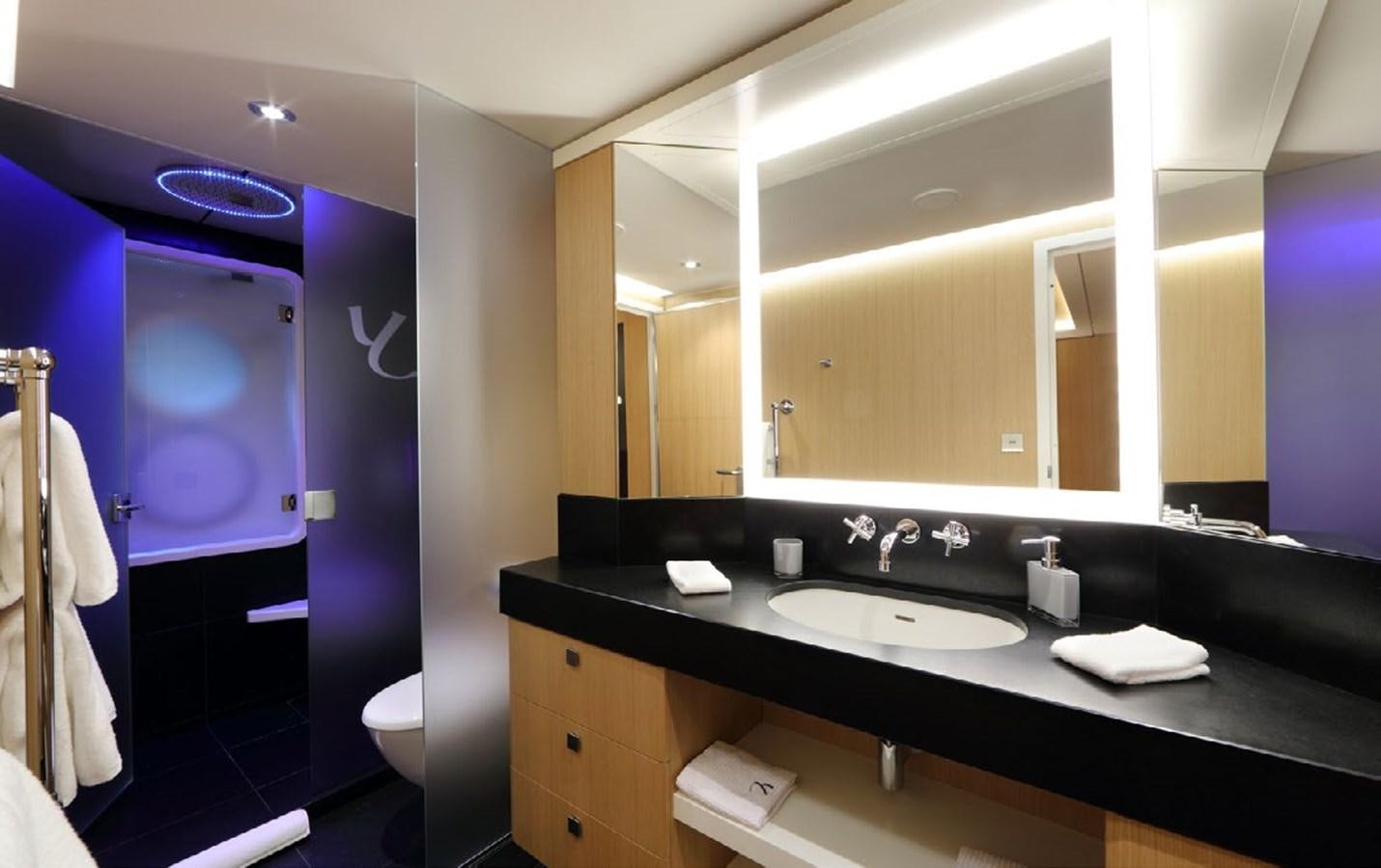 a bathroom with a sink and a mirror aboard YERSIN Yacht for Sale