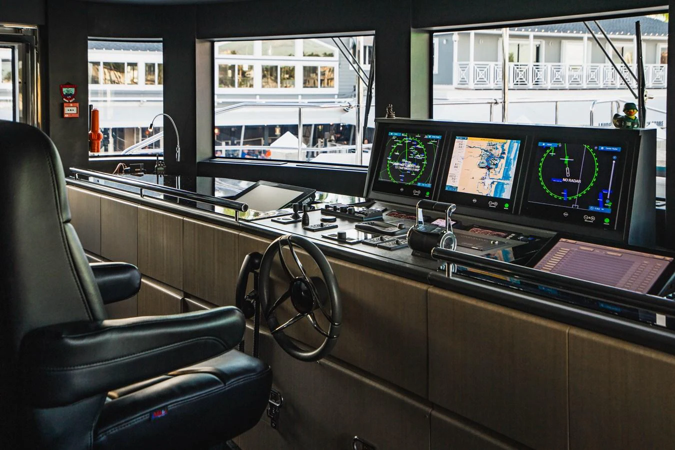 a control room with multiple monitors aboard ABBENTURES III Yacht for Sale