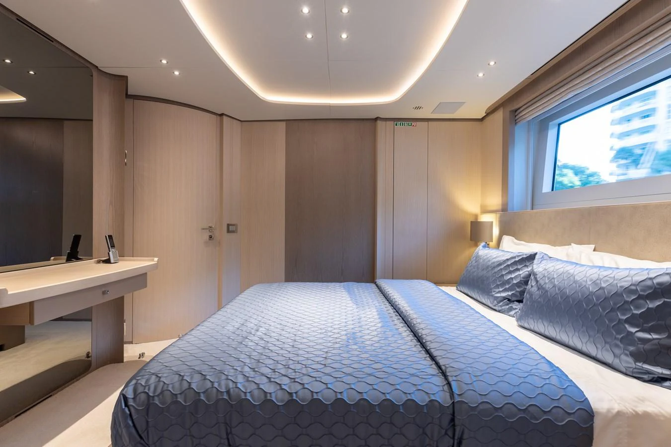 a bed in a room aboard ABBENTURES III Yacht for Sale
