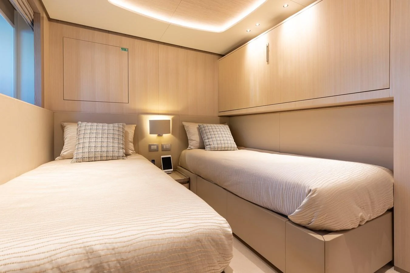 a room with two beds aboard ABBENTURES III Yacht for Sale
