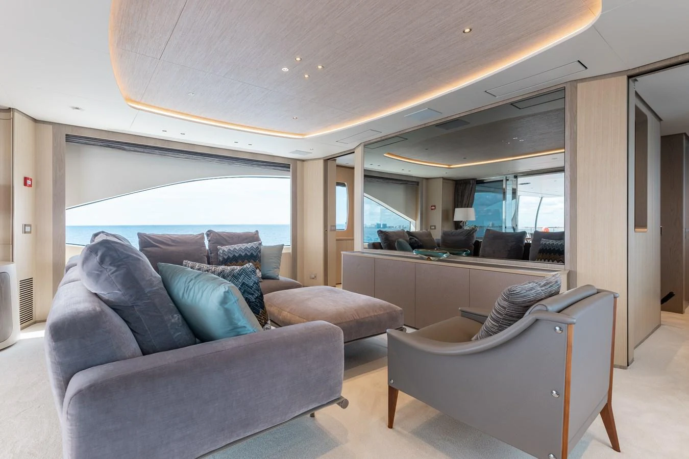 a living room with a couch and a tv aboard ABBENTURES III Yacht for Sale