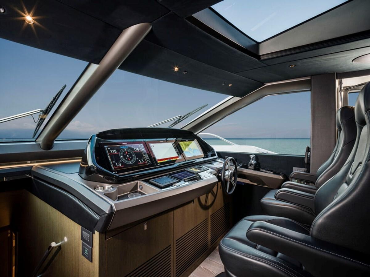inside of a car aboard 90 OCEAN Yacht for Sale