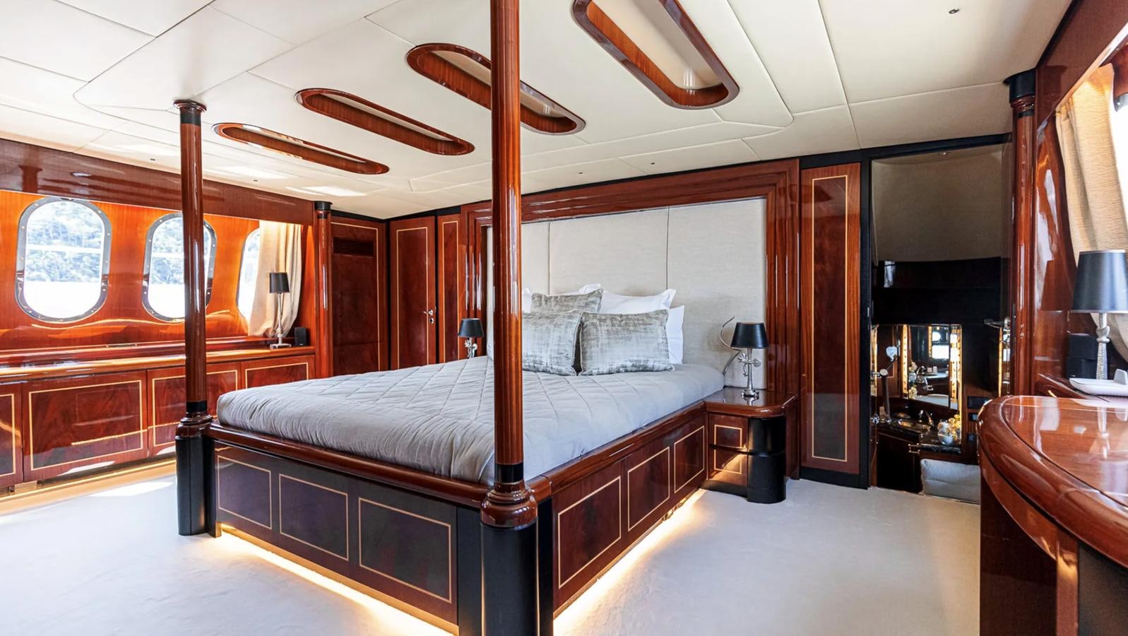 a bed in a room aboard SVEA Yacht for Sale