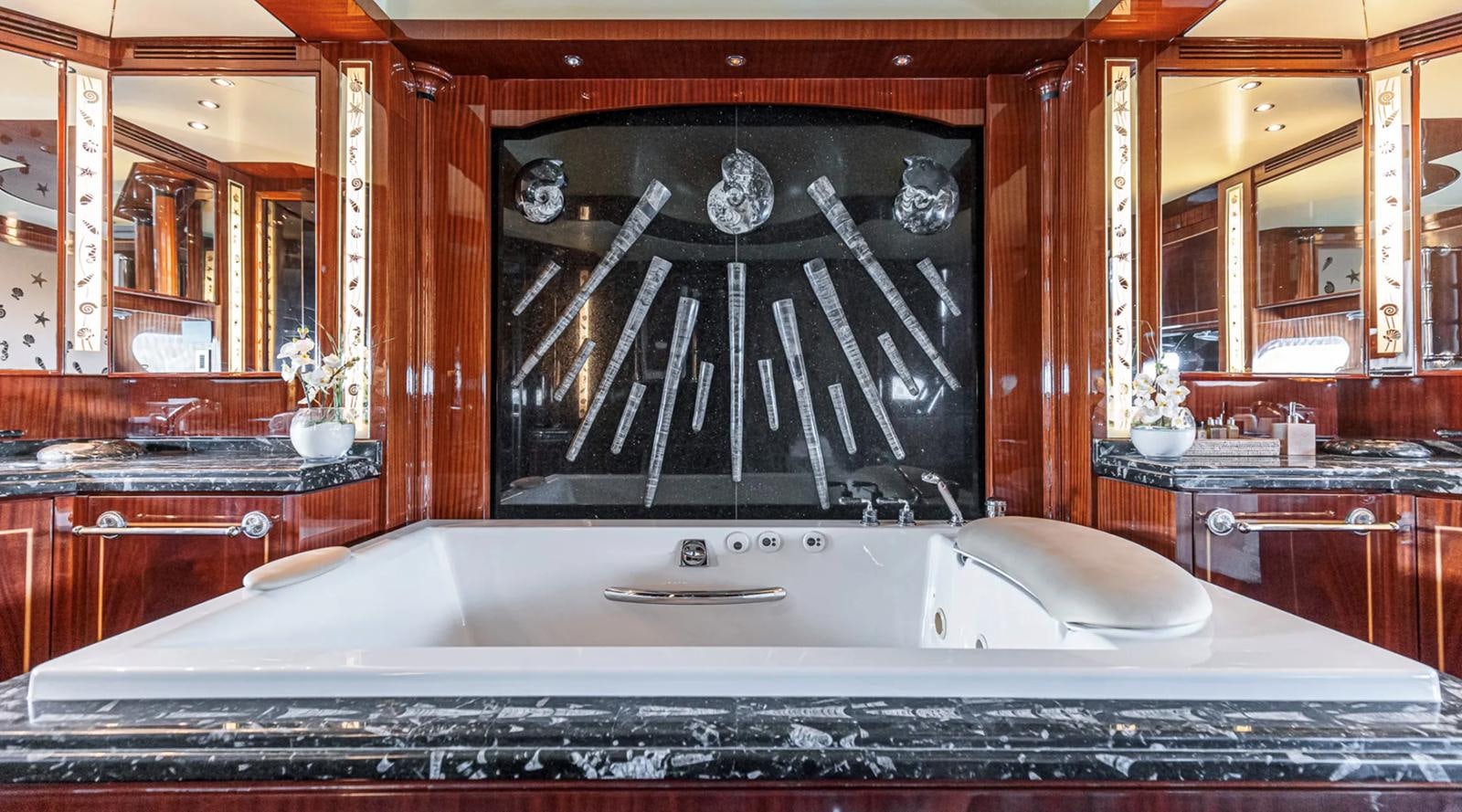 a large bathroom with a large bathtub aboard SVEA Yacht for Sale