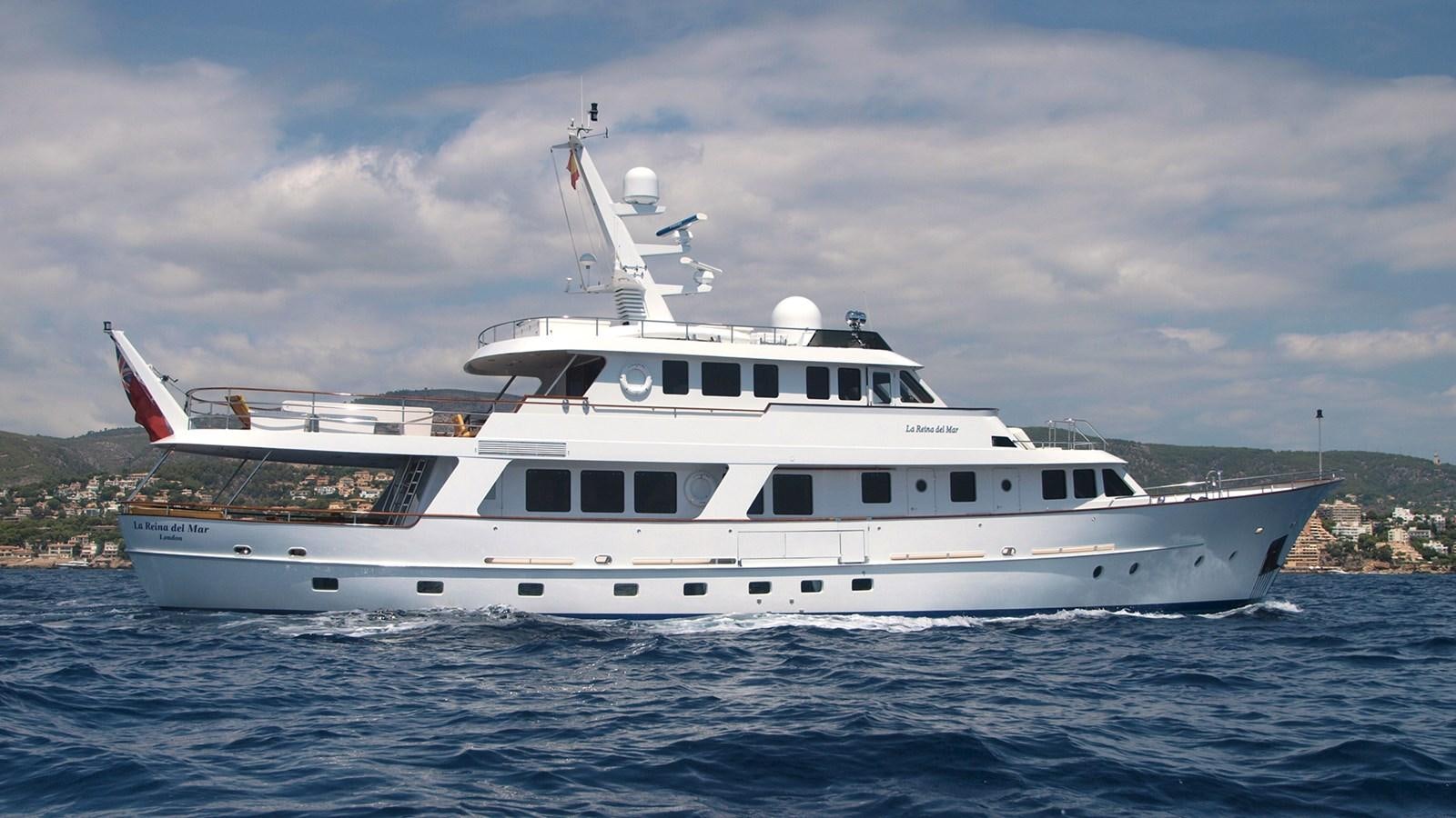 a large white yacht aboard LA REINA DEL MAR Yacht for Sale