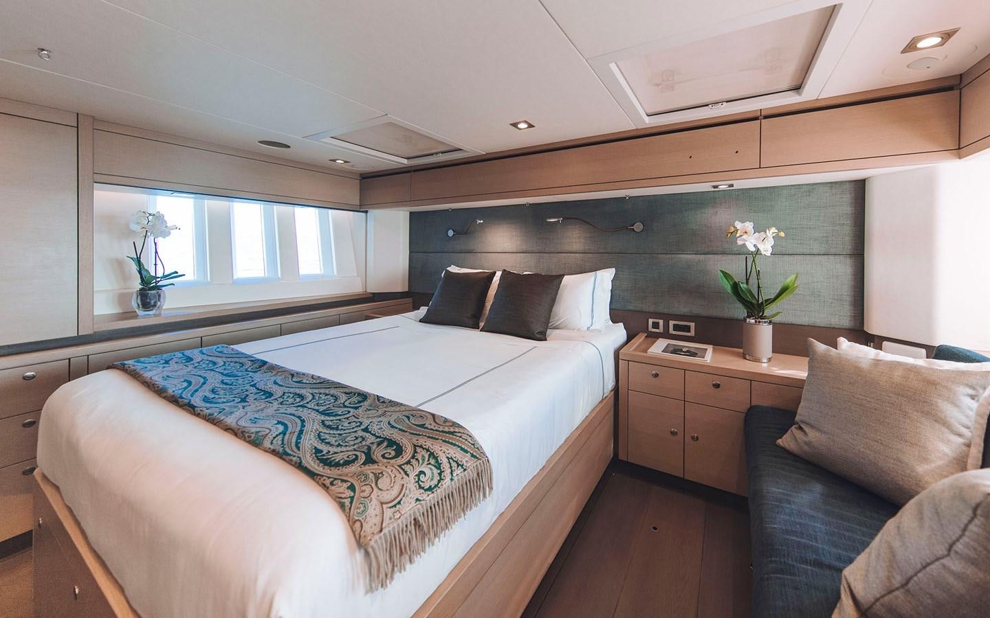a bed in a room aboard ENSO Yacht for Sale