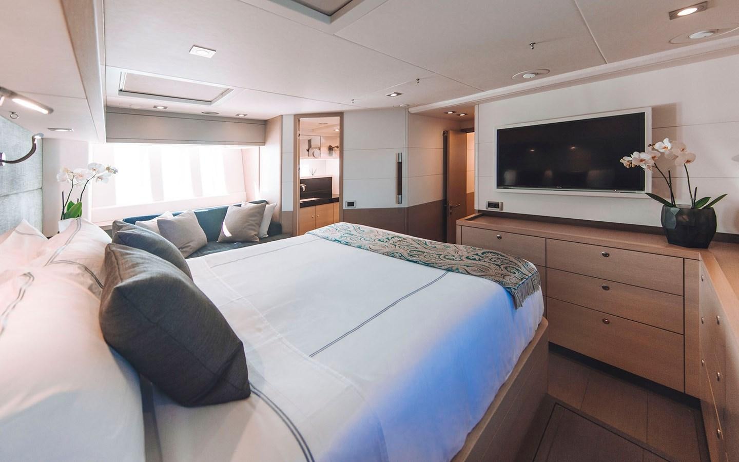 a bed in a room aboard ENSO Yacht for Sale