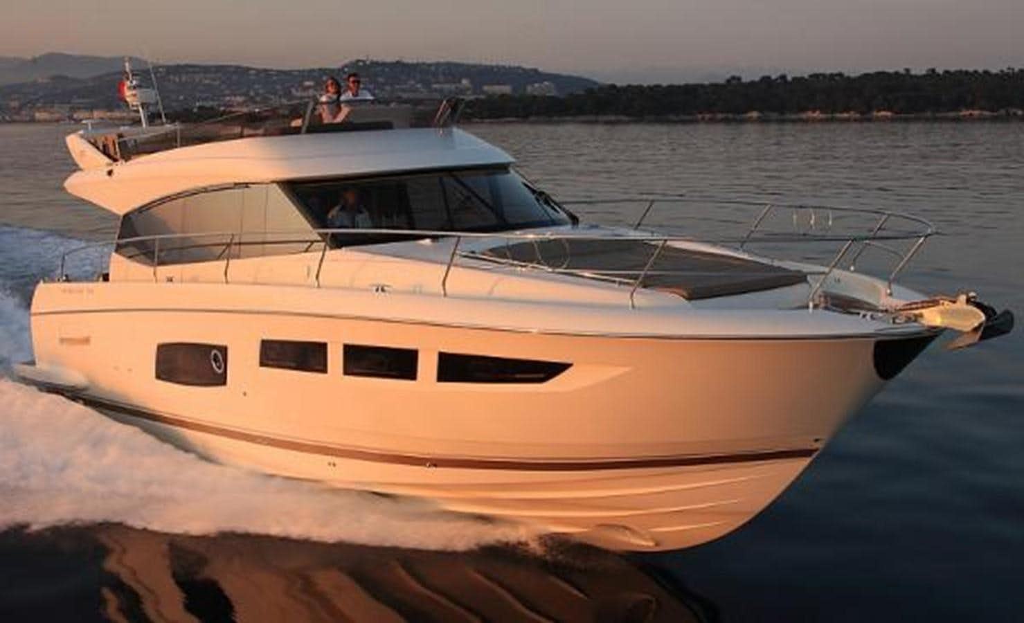 a white yacht on the water aboard PRESTIGE 620 Yacht for Sale
