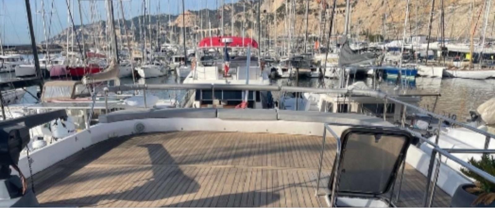 a deck with boats in it aboard SEA SEVEN Yacht for Sale